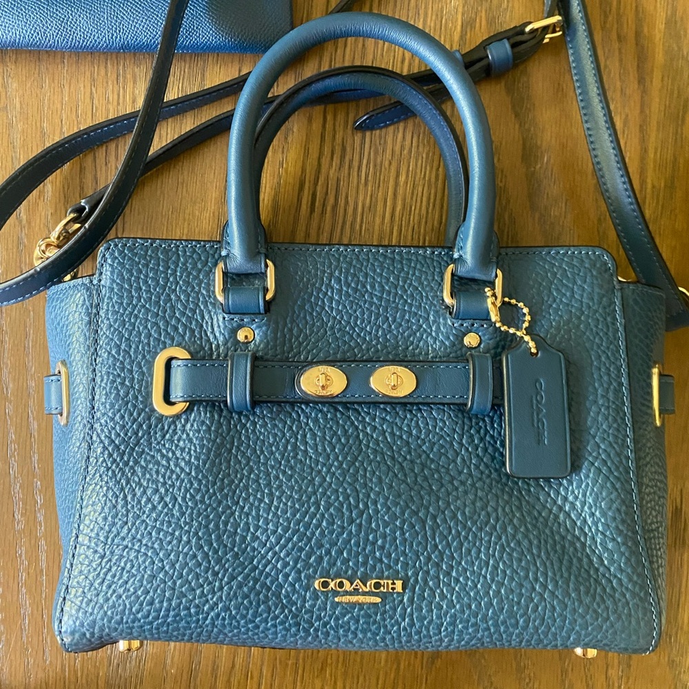 Coach Blue Textured mini Leather Satchel with top handles and cross body strap.
